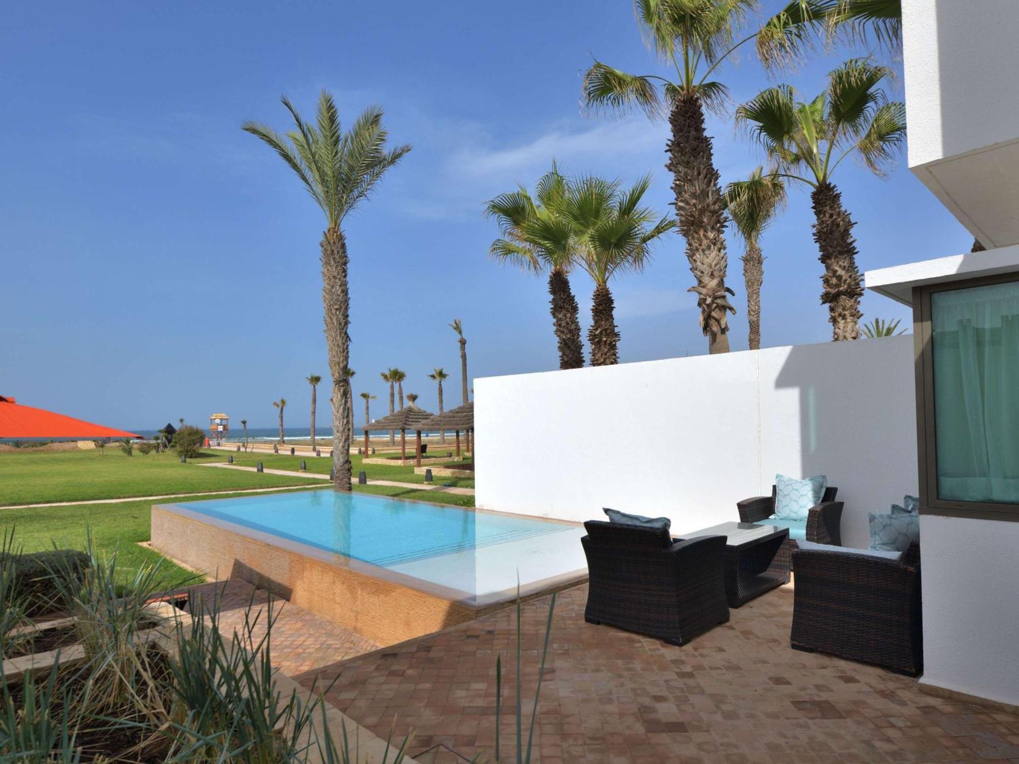 Sofitel Agadir Royal Bay Resort Bagian luar foto A private pool at the hotel